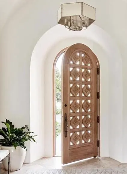 15 Trending Bedroom Door Designs to Make Your Room Feel Complete 9 Arched Wooden Door