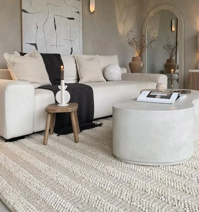 20 Cozy Cottage Living Room Ideas That Feel Like a Warm Hug 11 Woven Jute Rug Layers