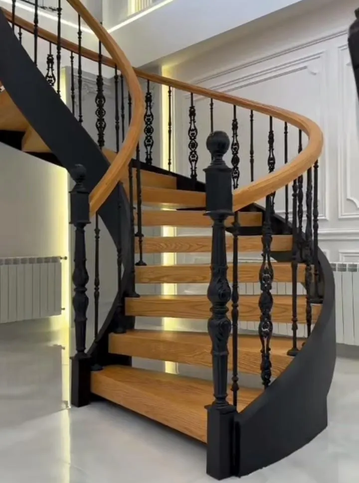 20 Stunning and Unique Staircase Ideas for a Modern Home That Elevate Every Step 3 Spiral Wooden Staircase with Iron Rails