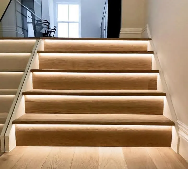 20 Stunning and Unique Staircase Ideas for a Modern Home That Elevate Every Step 5 Warm Oak Steps with Hidden Lighting